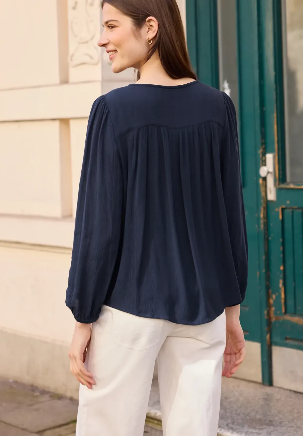 3/4 mouw blouse met ronde hals en knopen