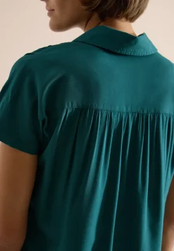 Basic blouse met overhemdkraag in effen kleur