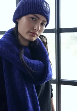 Beanie met badge