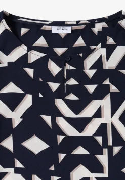 Bedrukte blouse met getapete manchetten