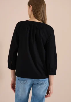 Blouse met 3/4 mouwen en gespleten hals in effen kleur
