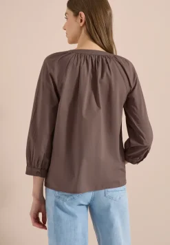 Blouse met 3/4 mouwen en gespleten hals in effen kleur