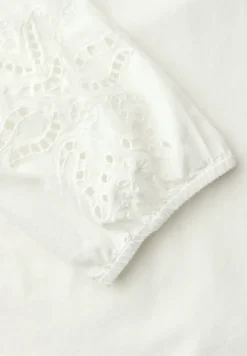 Blouse met gespleten hals en borduursel