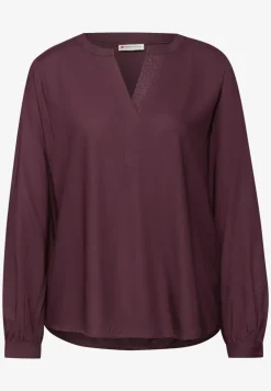 Blouse met glitterdetail