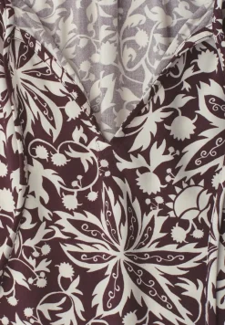 Blouse met hangende schouder en linten