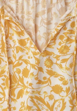 Blouse met hangende schouder en linten
