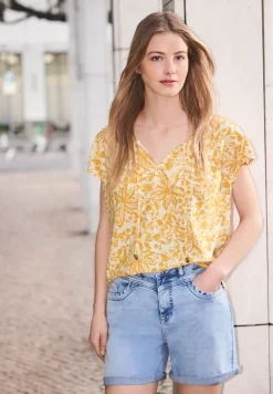 Blouse met hangende schouder en linten
