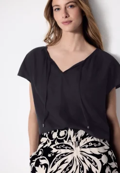 Blouse met hangende schouder en linten
