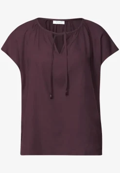 Blouse met hangende schouder en linten
