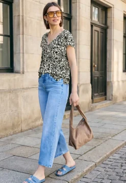 Blouse met hangende schouder en linten