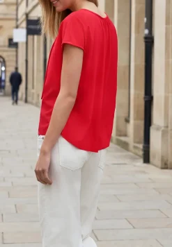 Blouse met hangende schouder en linten