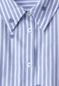 Blouse met hangende schouder en borduursel