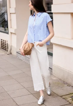 Blouse met hangende schouder en borduursel