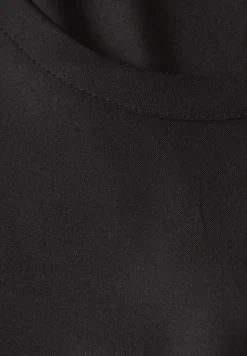 Blouse met knoopdetail