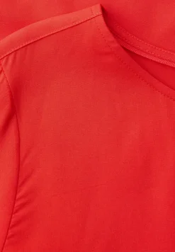 Blouse met korte mouwen en ronde hals in effen kleur
