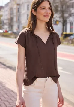 Blouse met losse schouders en gespleten hals