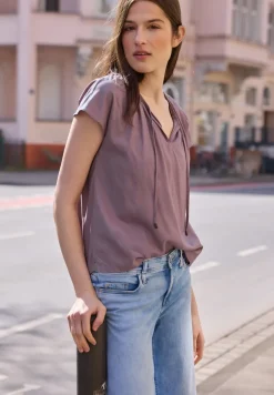 Blouse met losse schouders en gespleten hals