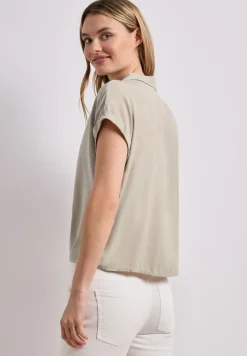 Blouse met overhangende schouders en bowlingkraag