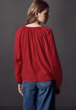 Blouse met plooien