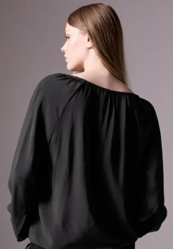 Blouse met plooien