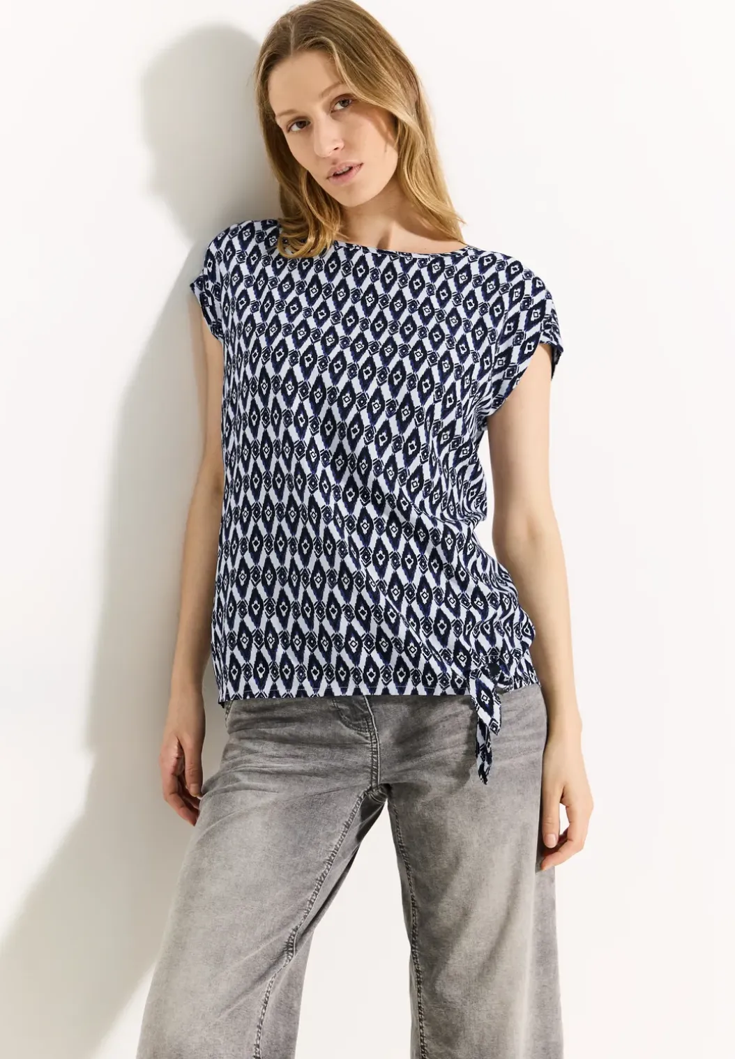 Blouse met print en knopen