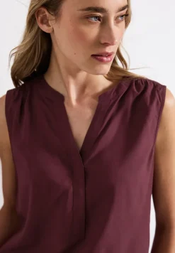 Blousetop met gespleten hals