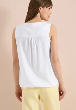 Blousetop met gespleten hals en linten