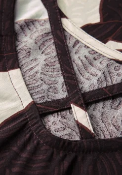Blousetop met lintdetails
