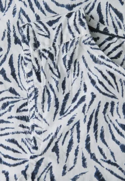 Blousetop met minimale print