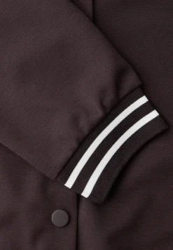 Blouson met college details