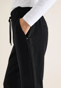 Broek met glittertape