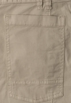 Broek met taps toelopende pijpen van keperstof