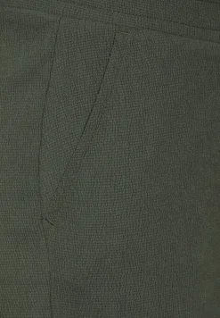 Broek met wijde pijpen en structuur