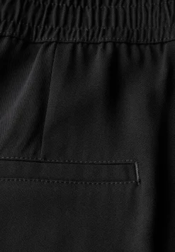 Broek met wijde pijpen in keperstof