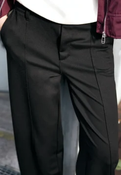 Broek met wijde pijpen in keperstof
