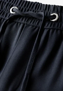 Broek met wijde pijpen in keperstof