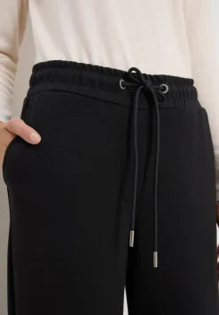 Broeken met wijde pijpen