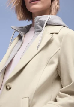 Coat met inlegwerk