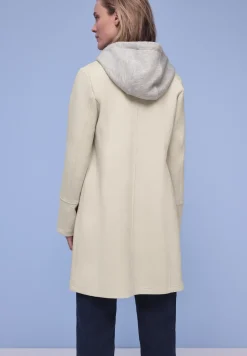 Coat met inlegwerk