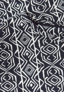 Gedessineerde jersey jurk