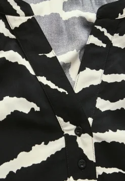 Gedessineerde raglan blouse