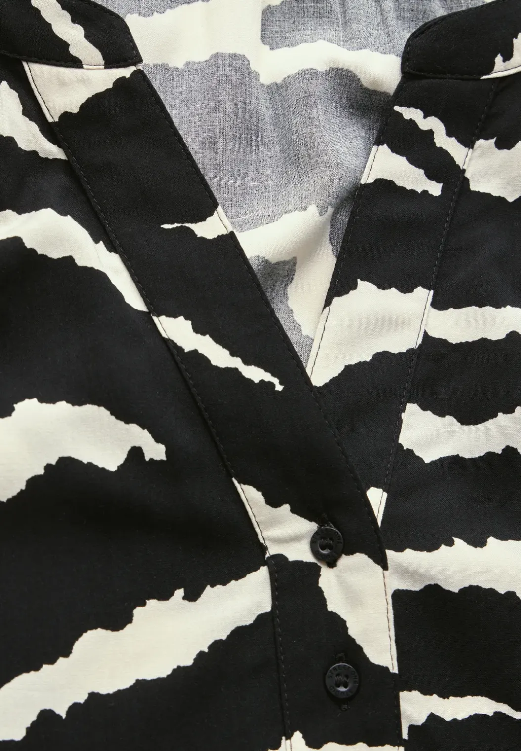 Gedessineerde raglan blouse
