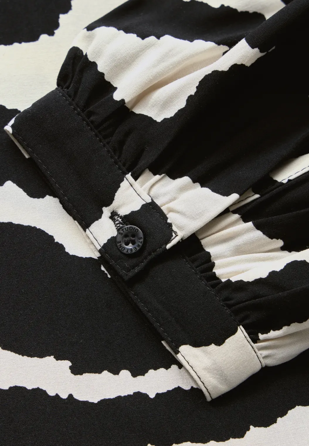 Gedessineerde raglan blouse