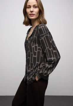 Gedessineerde tuniek met tape