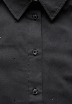 Glinsterende blouse