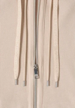 Jas met lange mouwen, capuchon en zakken