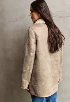 Jas met teddy details