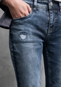 Jeans met destroyed details