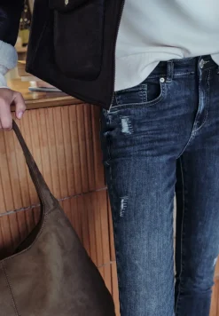 Jeans met destroyed details