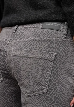 Jeans met slangenprint
